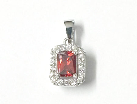 A Garnet & White Cubic Zirconia Pendant.
