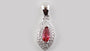 A Ruby & White Cubic Zirconia Pendant.