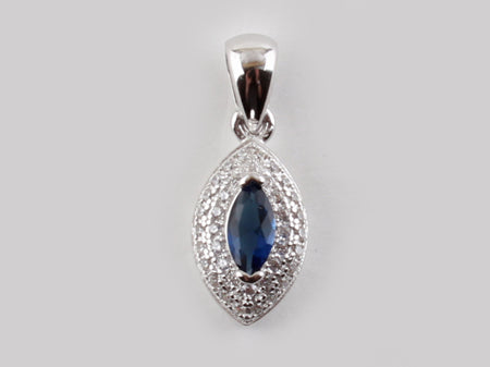 A Sapphire & White Cubic Zirconia Pendant.