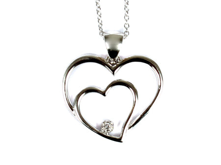 A White Cubic Zirconia Heart Pendant With Chain