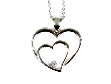 A White Cubic Zirconia Heart Pendant With Chain