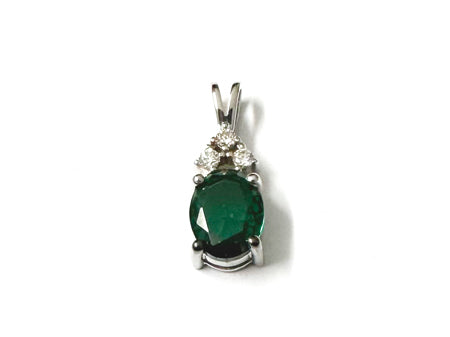 9 CT White Gold Emerald And White Cz Pendant