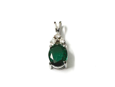 9 CT White Gold Emerald And White Cz Pendant
