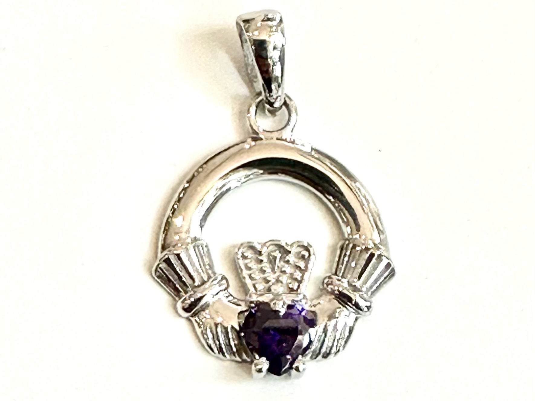 9CT White Gold Amethyst Birthstone Claddagh Pendant.
