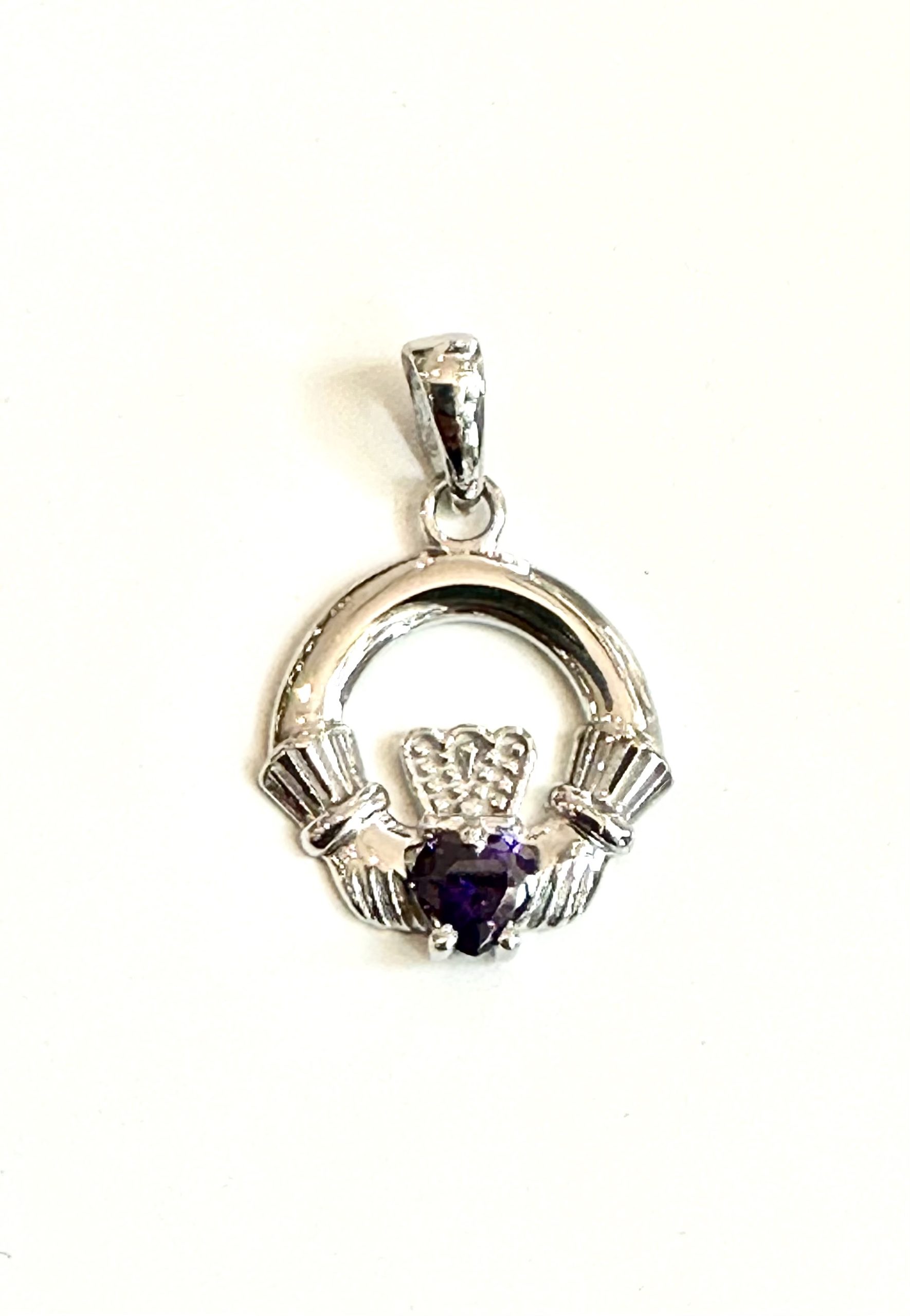 9CT White Gold Amethyst Birthstone Claddagh Pendant.