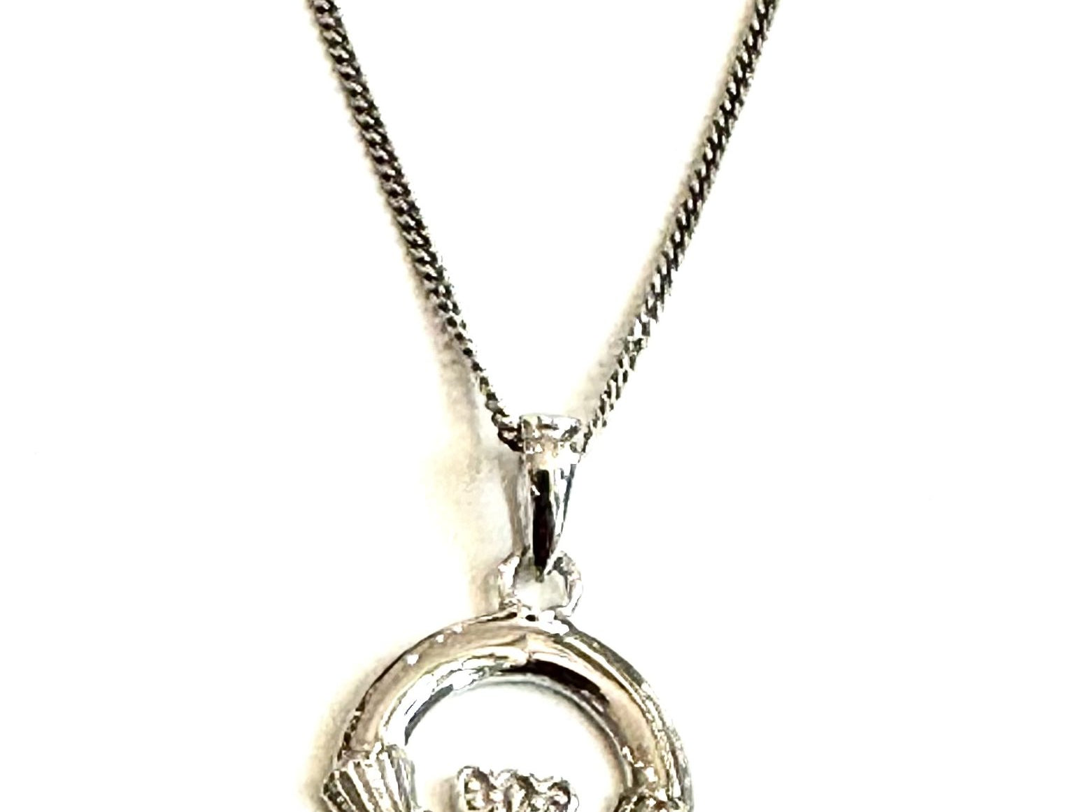 9CT White Gold Aqua Birthstone Claddagh Pendant.