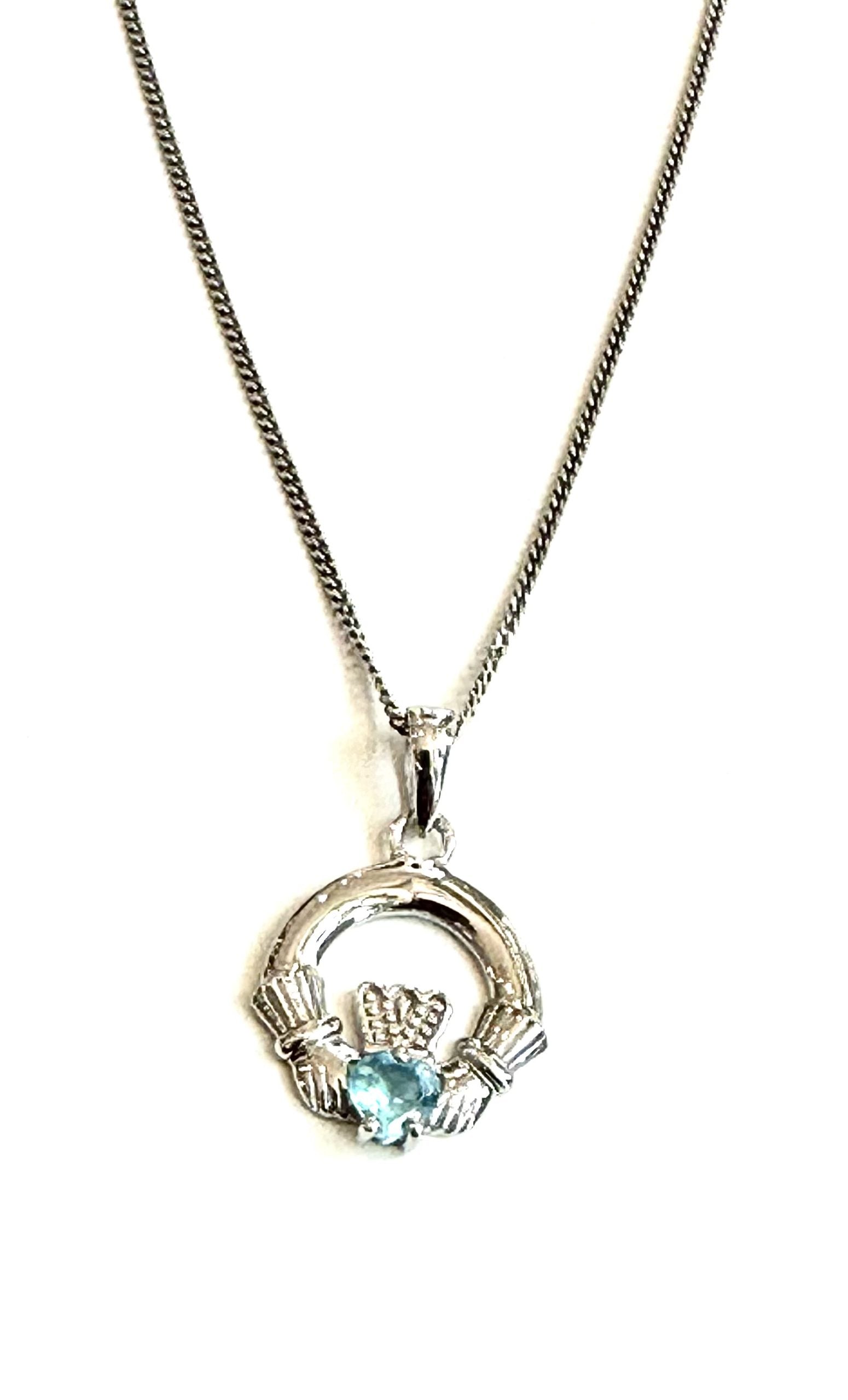 9CT White Gold Aqua Birthstone Claddagh Pendant.