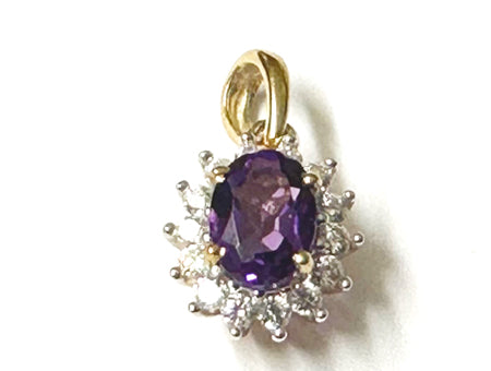 9 CT Yellow Gold Amethsyt Pendant.