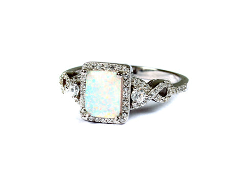 A Opal And White Cubic Zirconia Ring