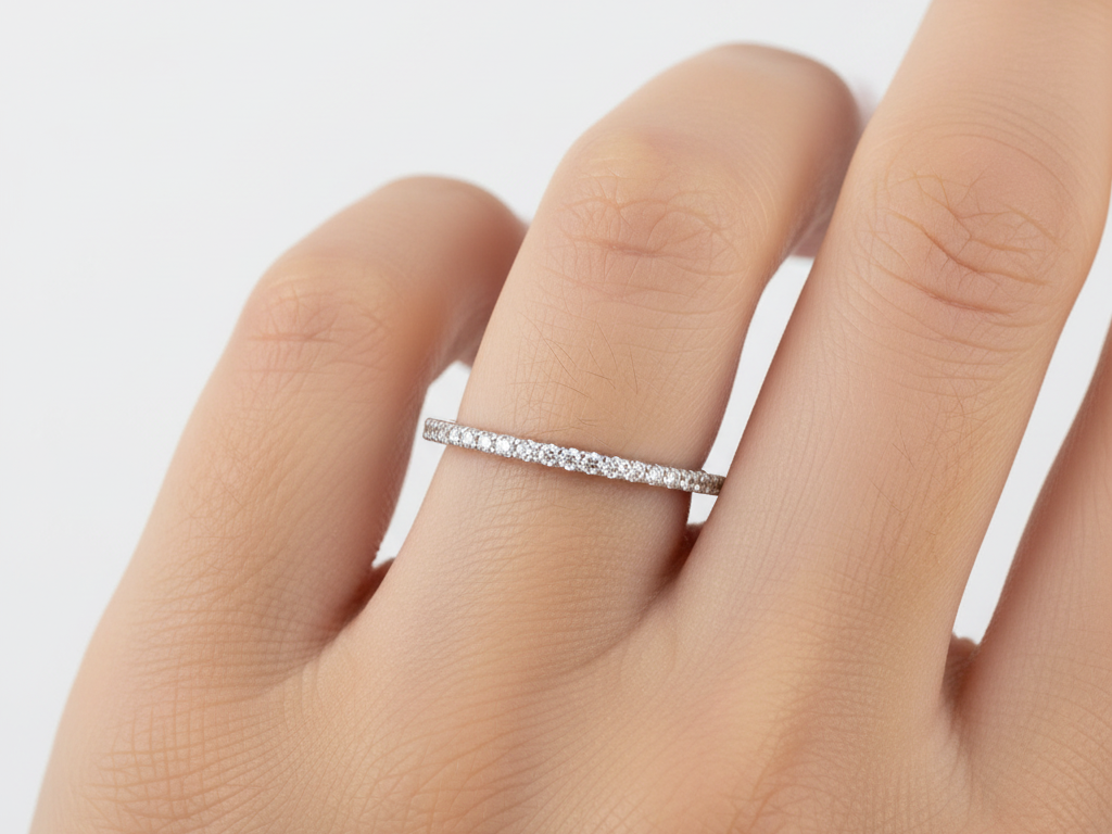 A White Cubic Zirconia Half Eternity Ring.