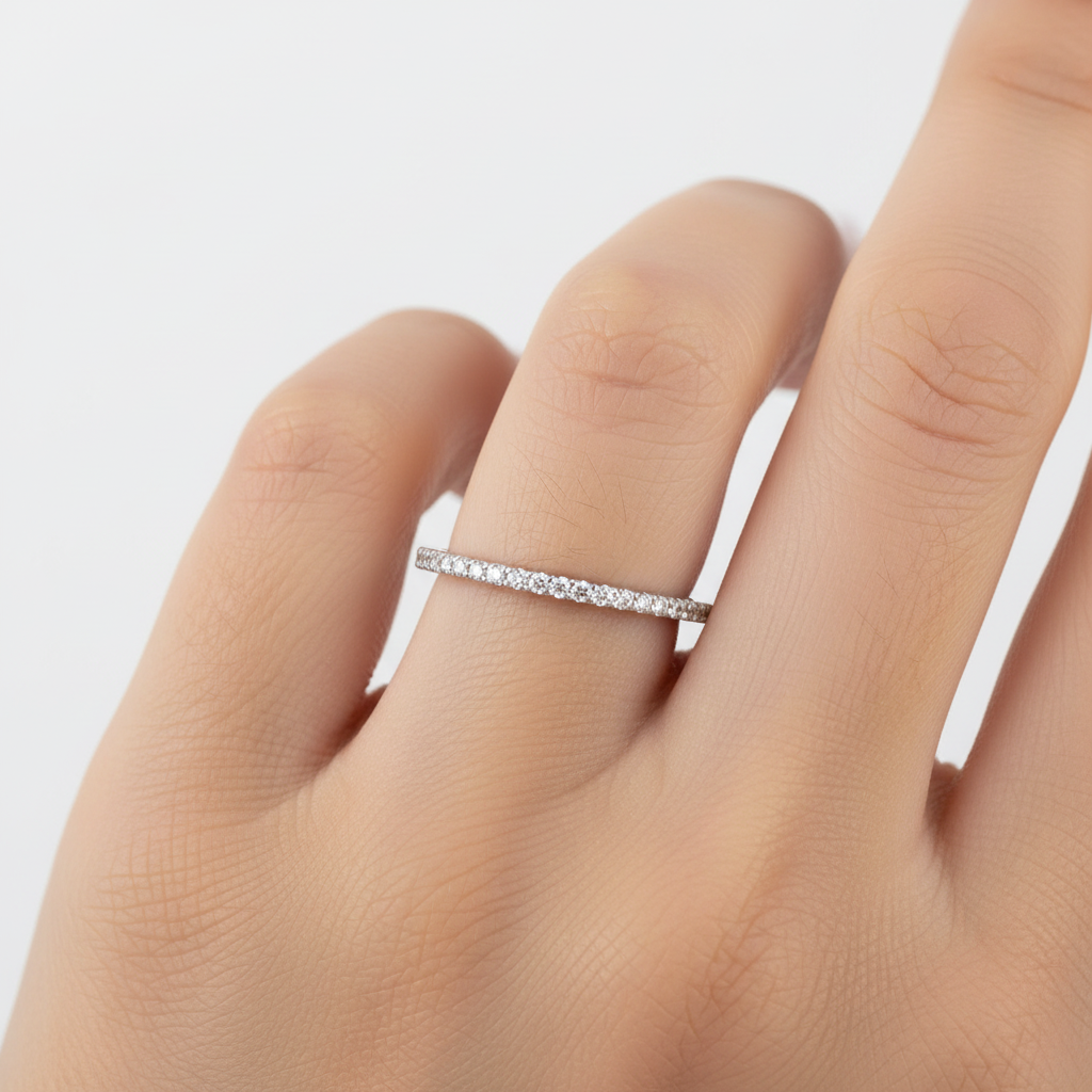 A White Cubic Zirconia Half Eternity Ring.