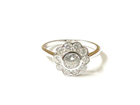 A White Cubic Zirconia Silver Flower Design Ring