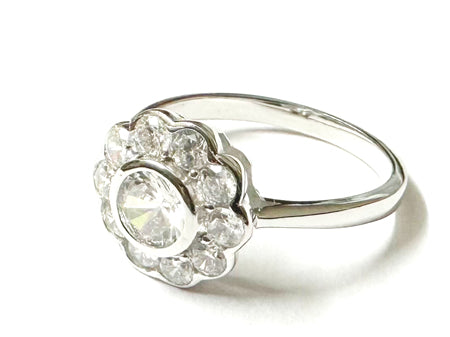 A White Cubic Zirconia Silver Flower Design Ring