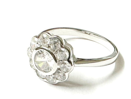 A White Cubic Zirconia Silver Flower Design Ring