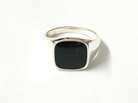 Silver Ring With A Square Shaped Black Onyx Stone.