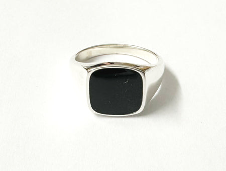Silver Ring With A Square Shaped Black Onyx Stone.