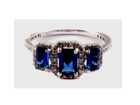 A 9ct White Gold Sapphire Cz Ring.