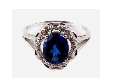 A 9ct White Gold Sapphire Cz Ring.