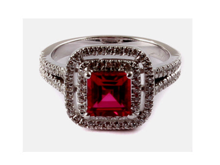 A 9ct White Gold Ruby Cz Ring.