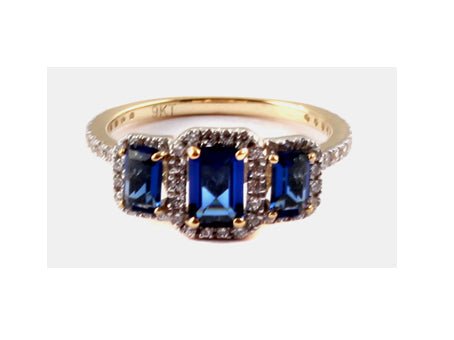 A 9ct Yellow Gold Sapphire Cz Ring.