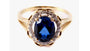 A 9ct Yellow Gold Sapphire Cz Ring.