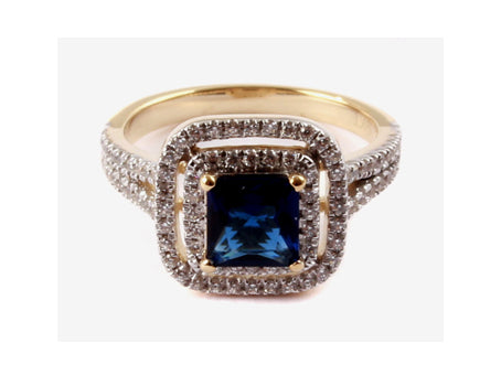 A 9ct Yellow Gold Sapphire Cz Ring.