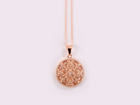 A Silver with Rose Gold Plate Pendant Chained