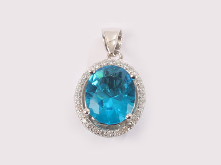 A Aquamarine & White Cubic Zirconia Pendant.