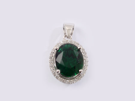 A Emerald & White Cubic Zirconia Pendant.
