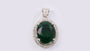 A Emerald & White Cubic Zirconia Pendant.