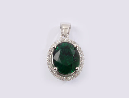 A Emerald & White Cubic Zirconia Pendant.