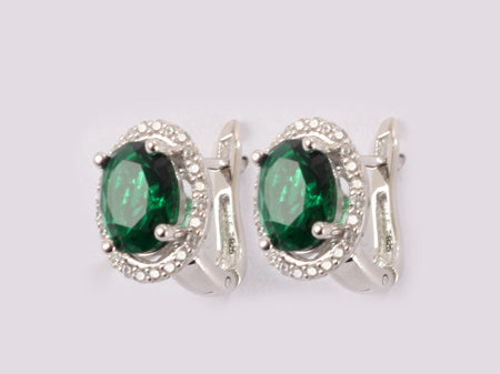 A Emerald & White Cubic Zirconia Earring.