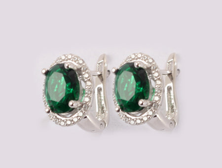 A Emerald & White Cubic Zirconia Earring.