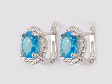 A Aquamarine & White Cubic Zirconia Earring.