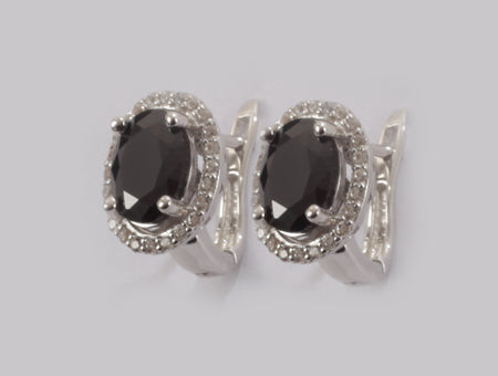 A Black & White Cubic Zirconia Earring.