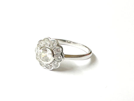 A White Cubic Zirconia Silver Flower Design Ring